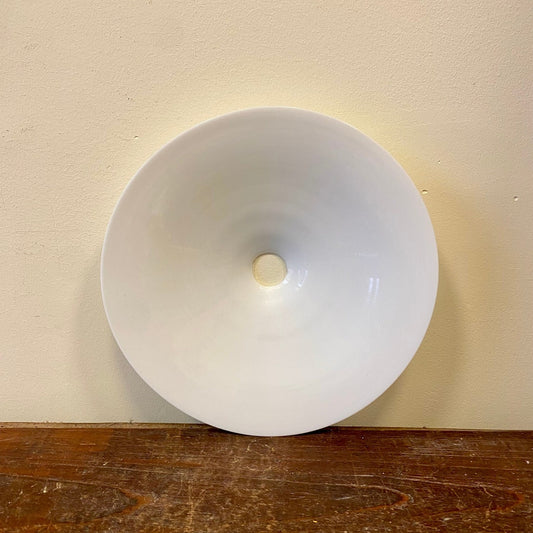Inside of the opaline lamp shade with the round fitting opening