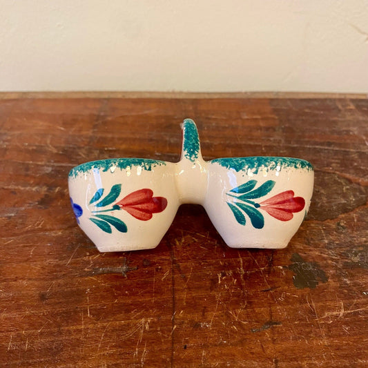 Double egg cup with painted red tulips, side view