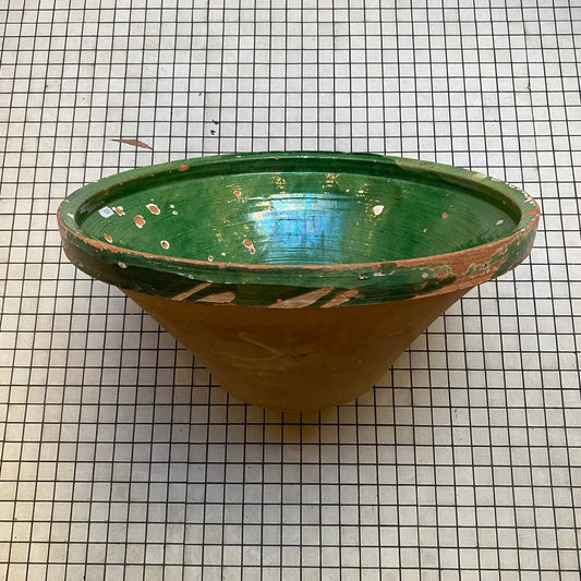 Antique tian bowl, side view with green-glazed rim and unglazed terracotta body