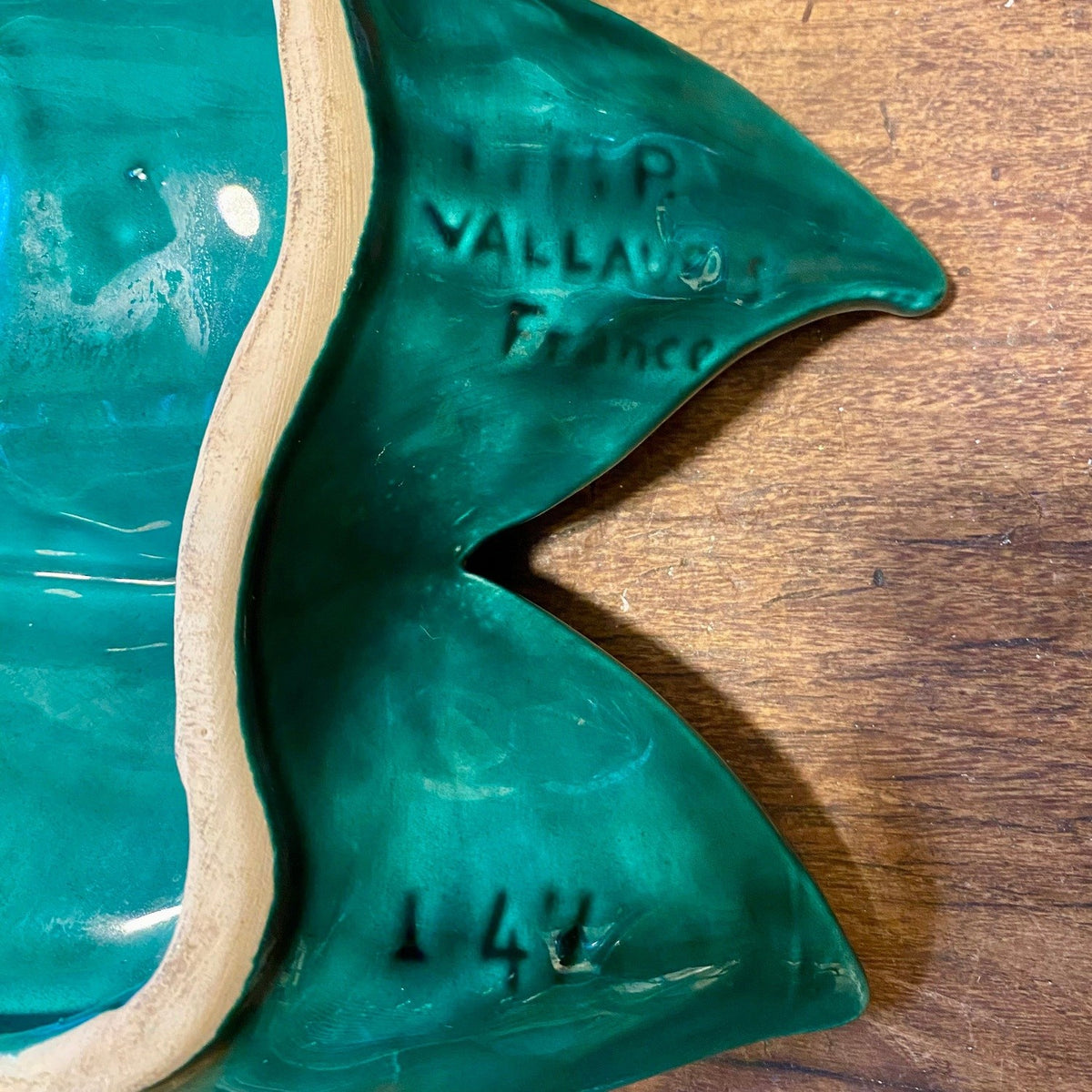 Close-up of the Vallauris France mark and number on the underside