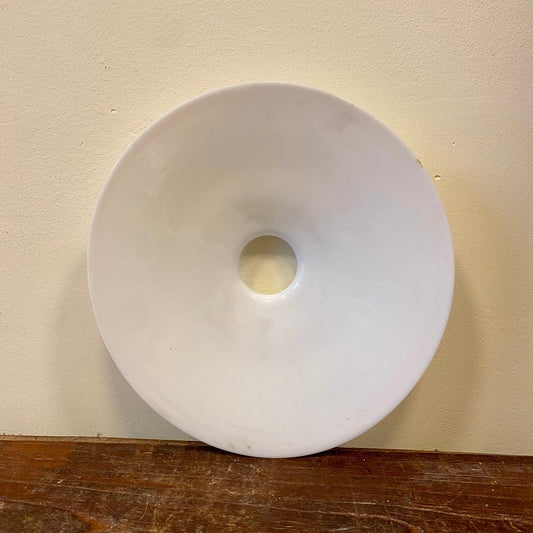 Inside of the opaline lamp shade, smooth white glass with the round fitting opening
