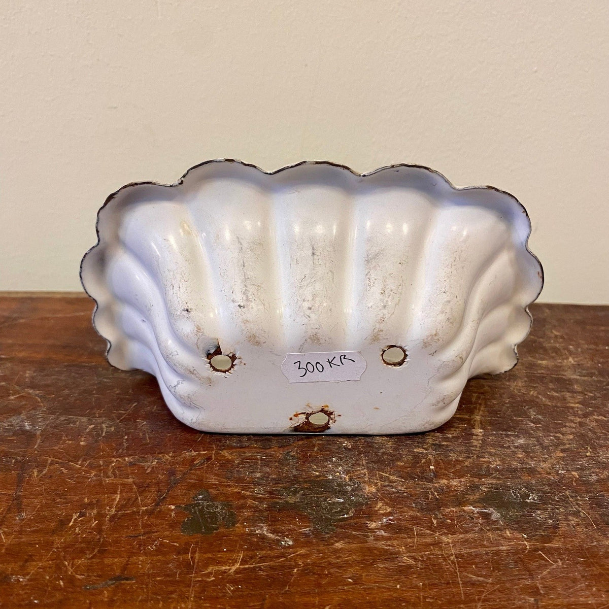 Underside of the soap dish with three drain holes
