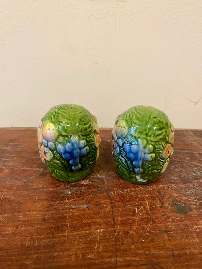 Pair of green fruit-relief salt and pepper shakers, front view