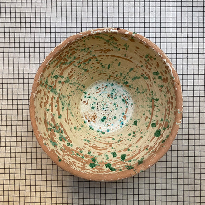 Antique pale yellow and green Provençal tian bowl seen from above