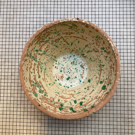 Antique pale yellow and green Provençal tian bowl seen from above