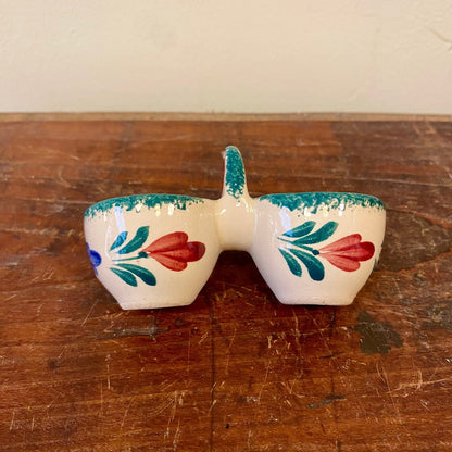 Double egg cup with painted red tulips, side view