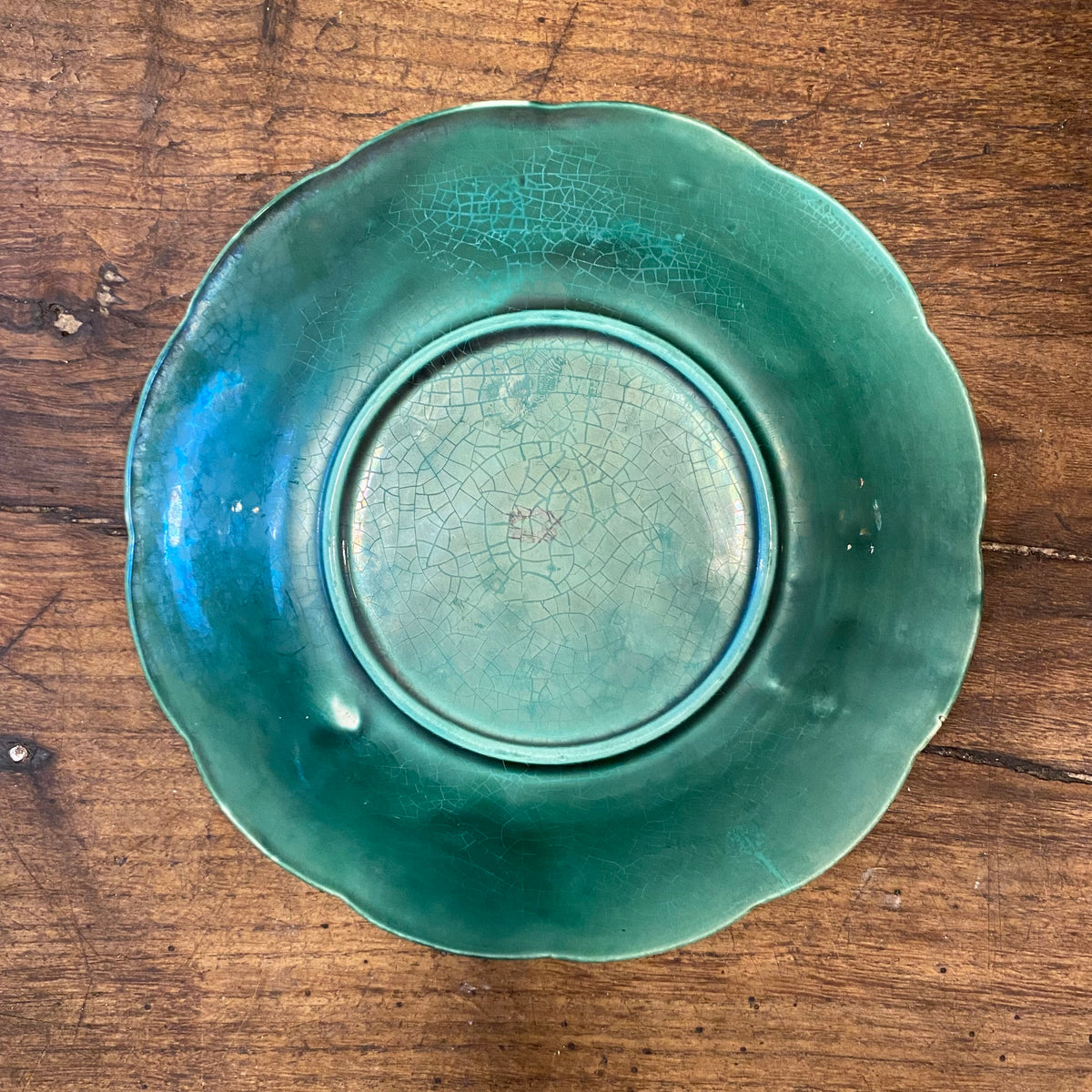 Back of the paler plate, with crazed glaze on the foot