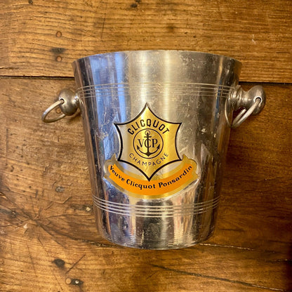 Vintage French Veuve Clicquot Ponsardin aluminium champagne bucket with twin ring handles and a gold and orange anchor crest label