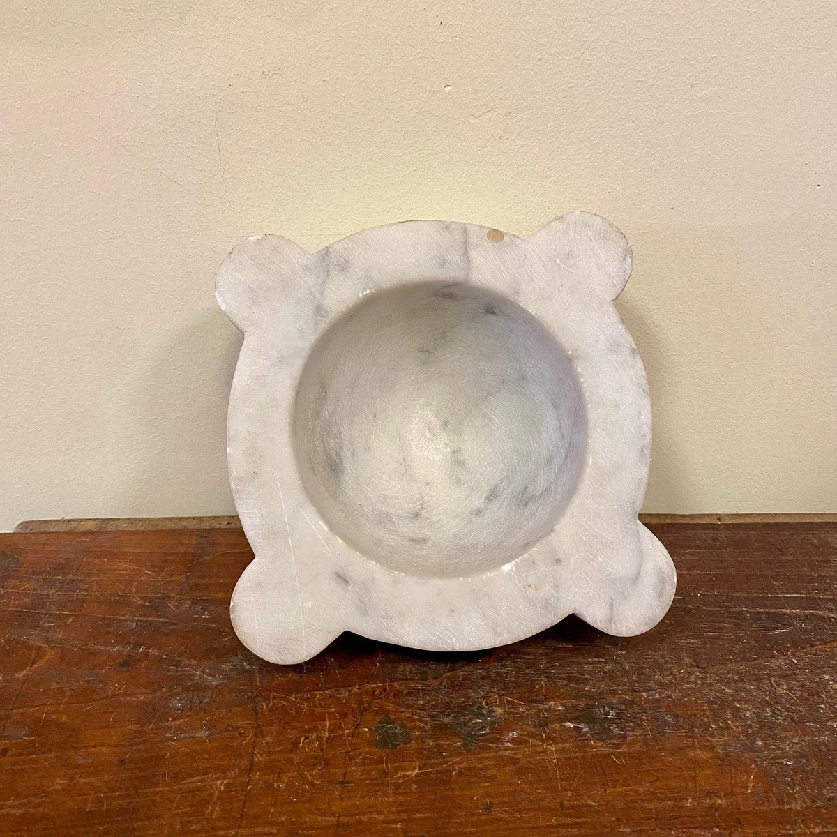 Marble mortar with four lugs, seen from above