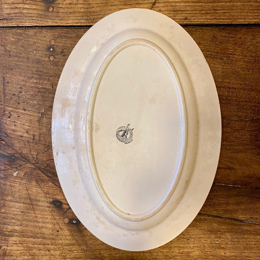 Moulin des Loups & Hamage oval serving platter seen from above, showing light marks on the surface