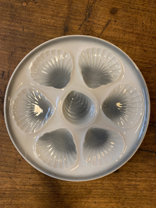 French vintage oyster plate in white glazed ceramic with shell-shaped compartments / Fransk ostronfat i vit glaserad keramik med snäckformade fack
