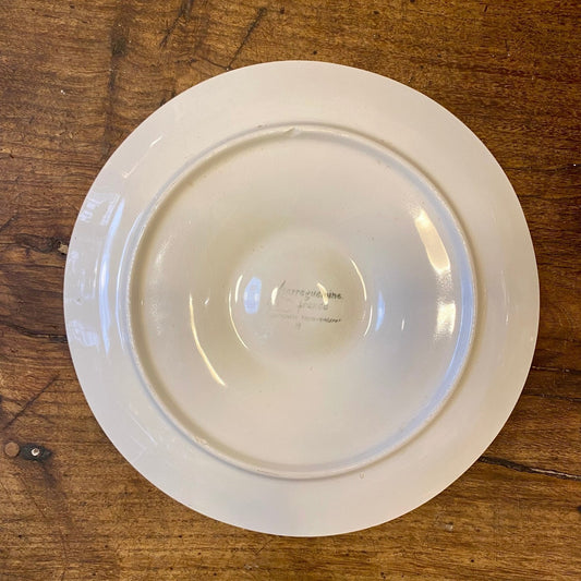 Underside of the Sarreguemines oyster plate showing the foot ring and mark