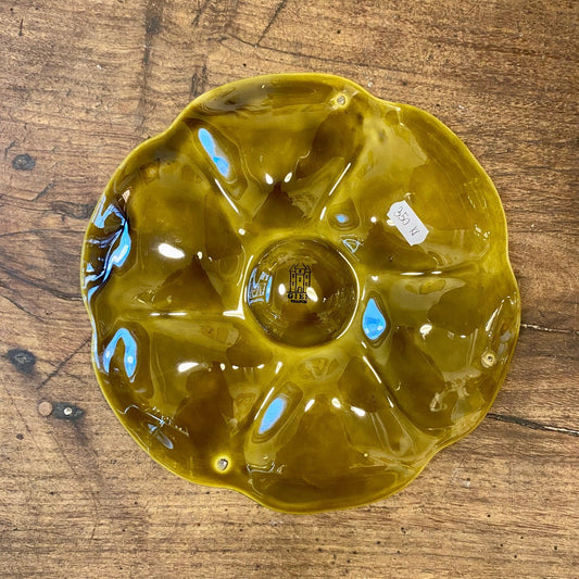 Underside of a vintage French Gien oyster plate with the Gien castle mark and France
