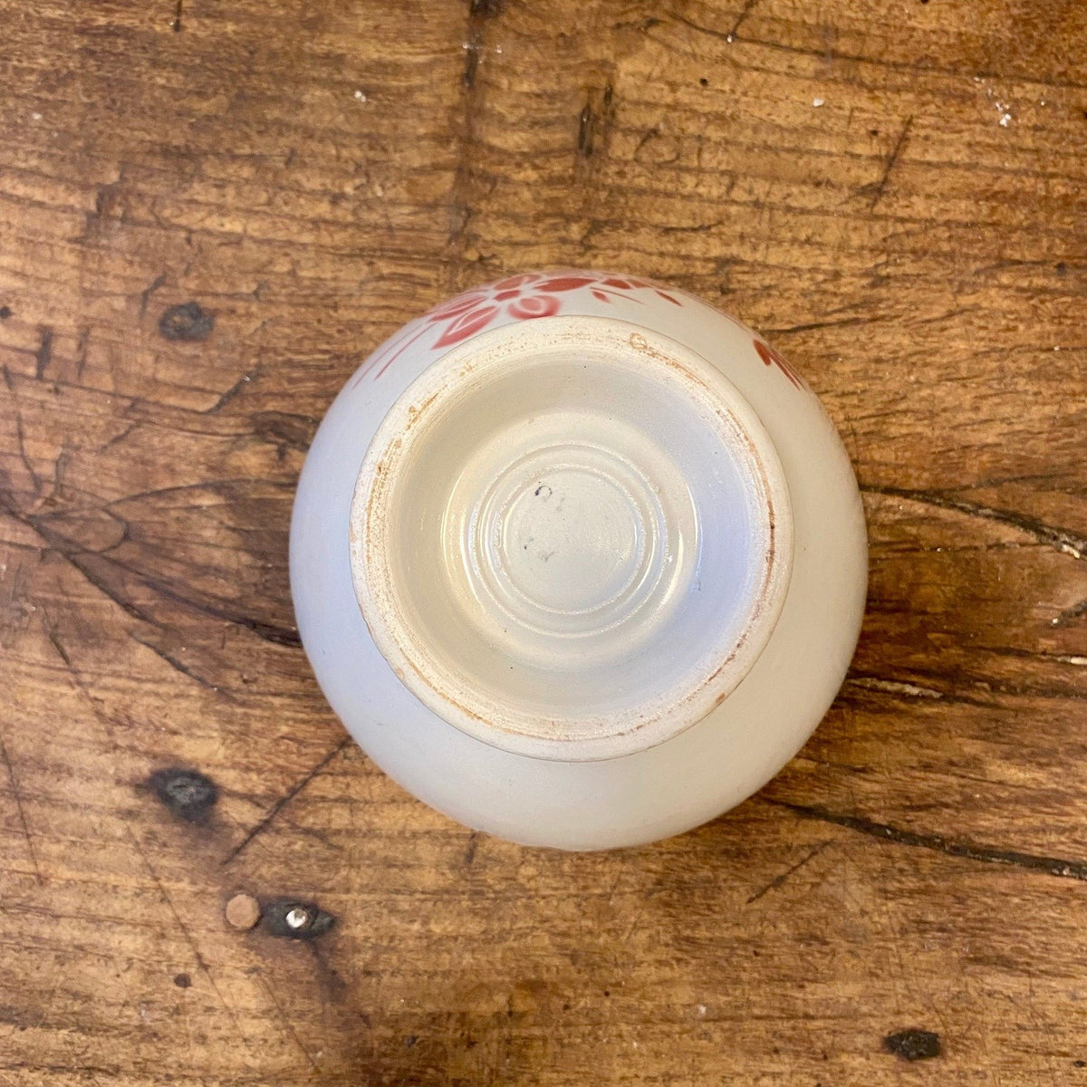 Underside and foot of a vintage French café au lait bowl