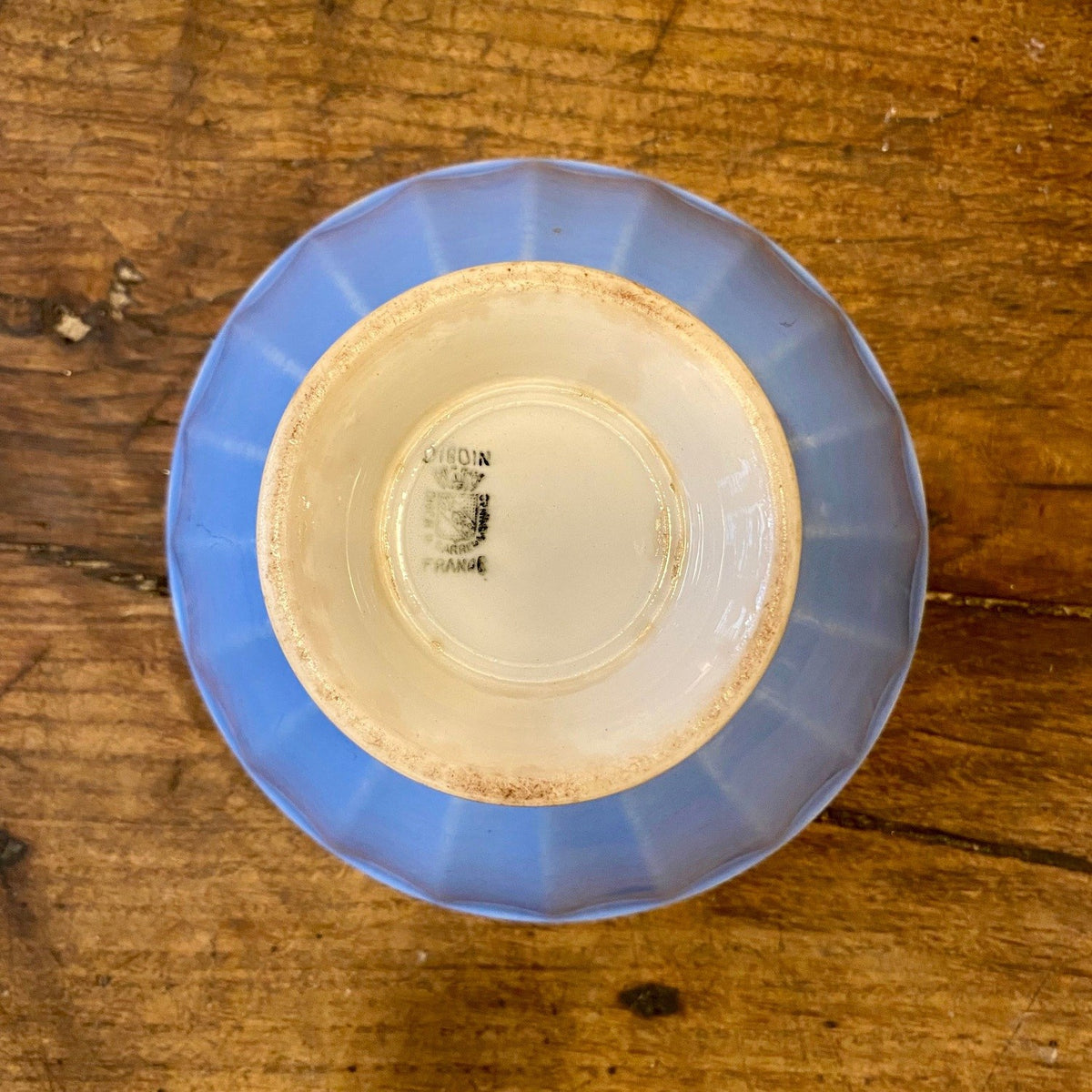 Underside of a vintage French café au lait bowl with the Digoin France mark