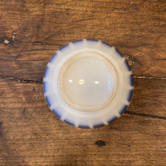 Underside and foot of a vintage French blue café au lait bowl