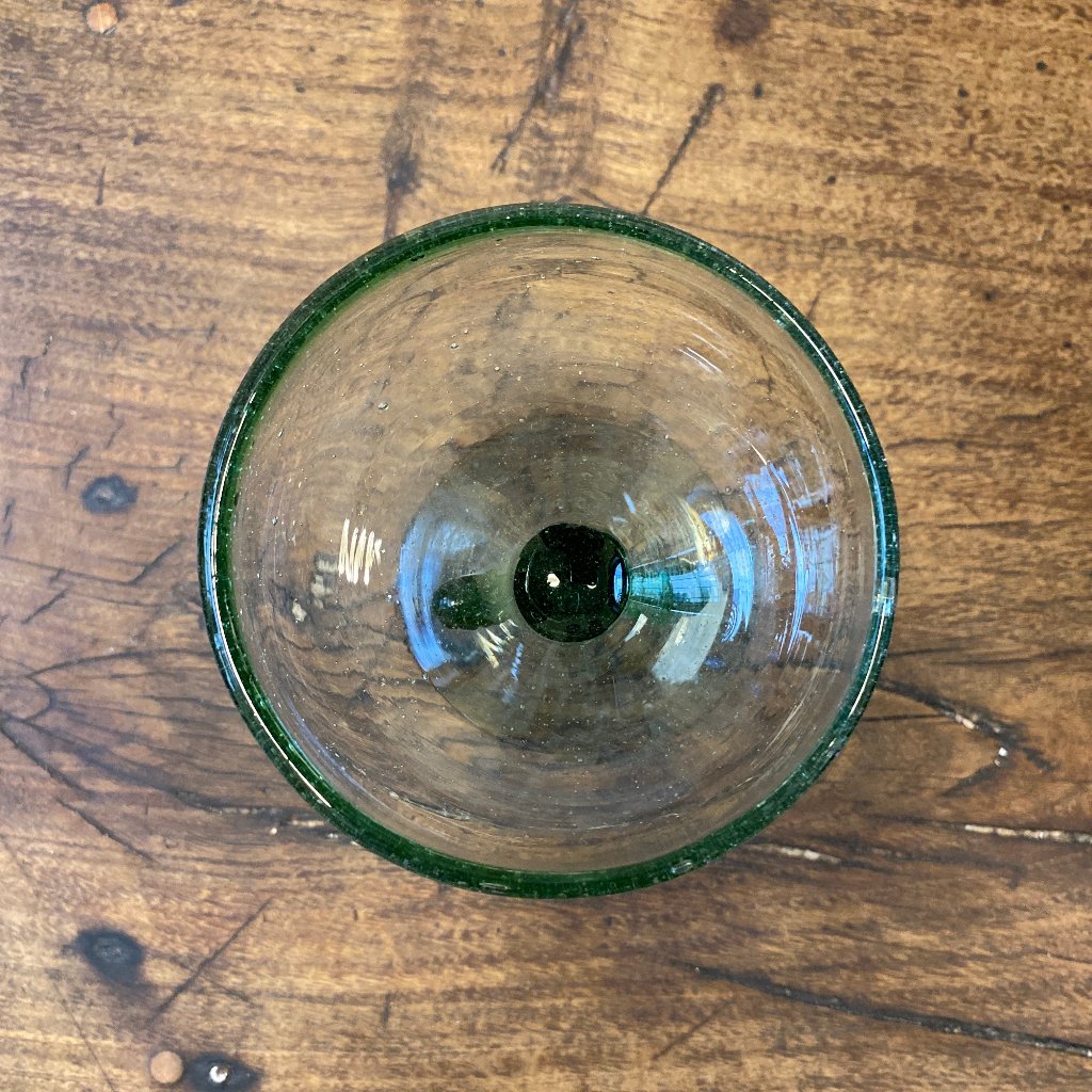 A margarita glass from above showing its hints of green. 