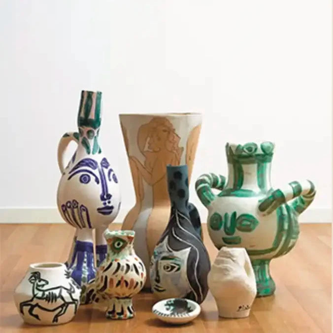 a picture of picasso's ceramics in different shapes and forms.